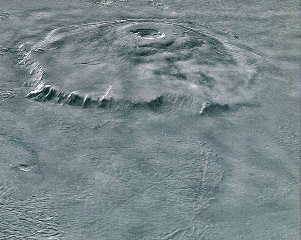Олимп ( лат. Olympus Mons ) — потухший вулкан на Марсе , самая высокая гора в Солнечной системе . До полетов космических аппаратов (которые показали, что Олимп — гора) это место было известно астрономам как Nix Olympica («Снега Олимпа» — ввиду более высокого альбедо ).