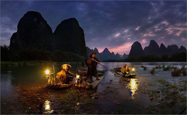 Рыбаки на реке Лицзян, городской округ Гуйлинь в южной части Китая.